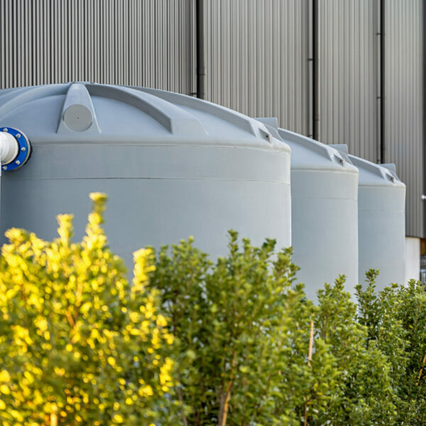 Tāwharau Lane rainwater harvesting tanks collection tanks providing 108,000L of storage capacity, reducing potable water consumption